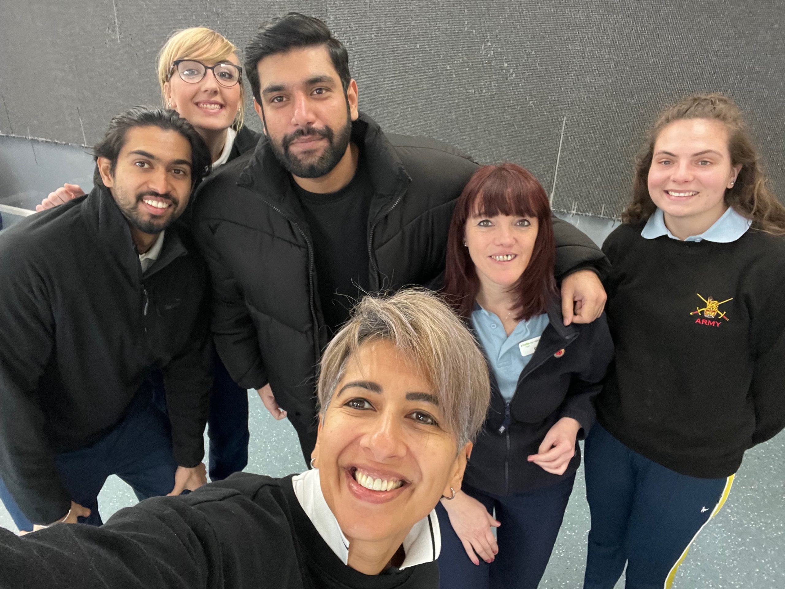 Group of people taking a selfie on their Pulmonary Rehabilitation placement. They are all smiling and looking at the camera.